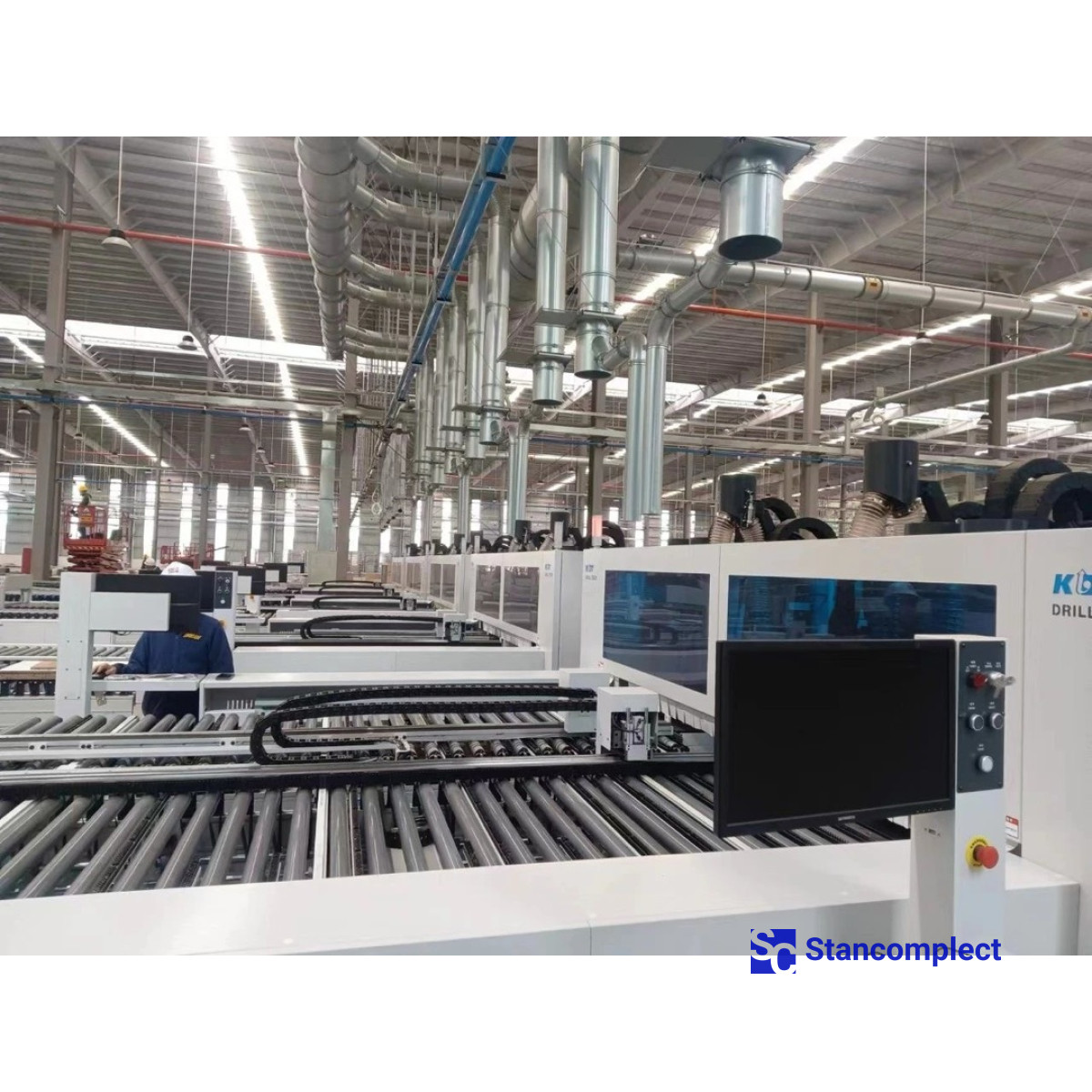 CNC drilling center KD-812ZA with two working tables, six drilling groups and milling with tool change